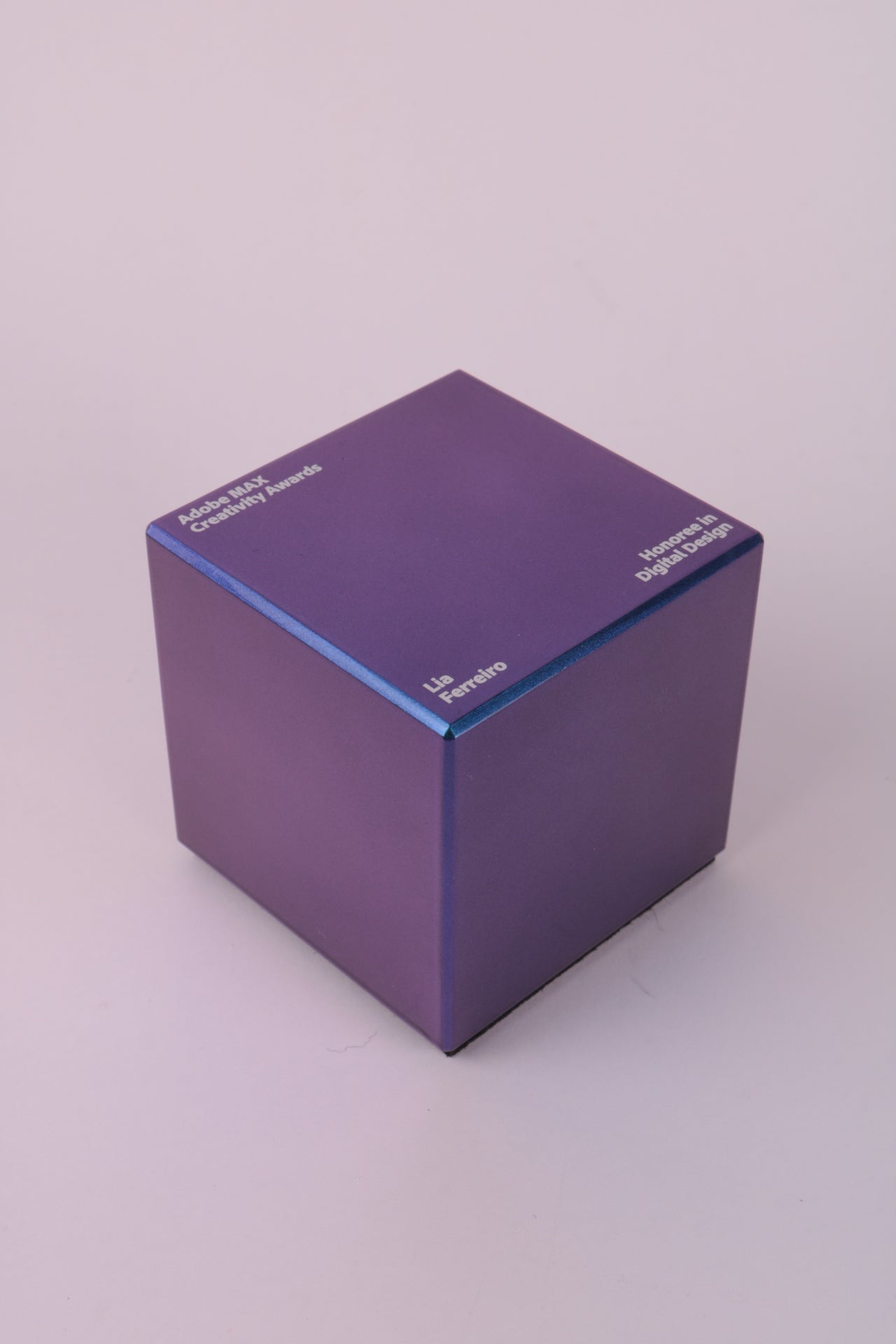 Purple cube as a custom trophy for adobe award