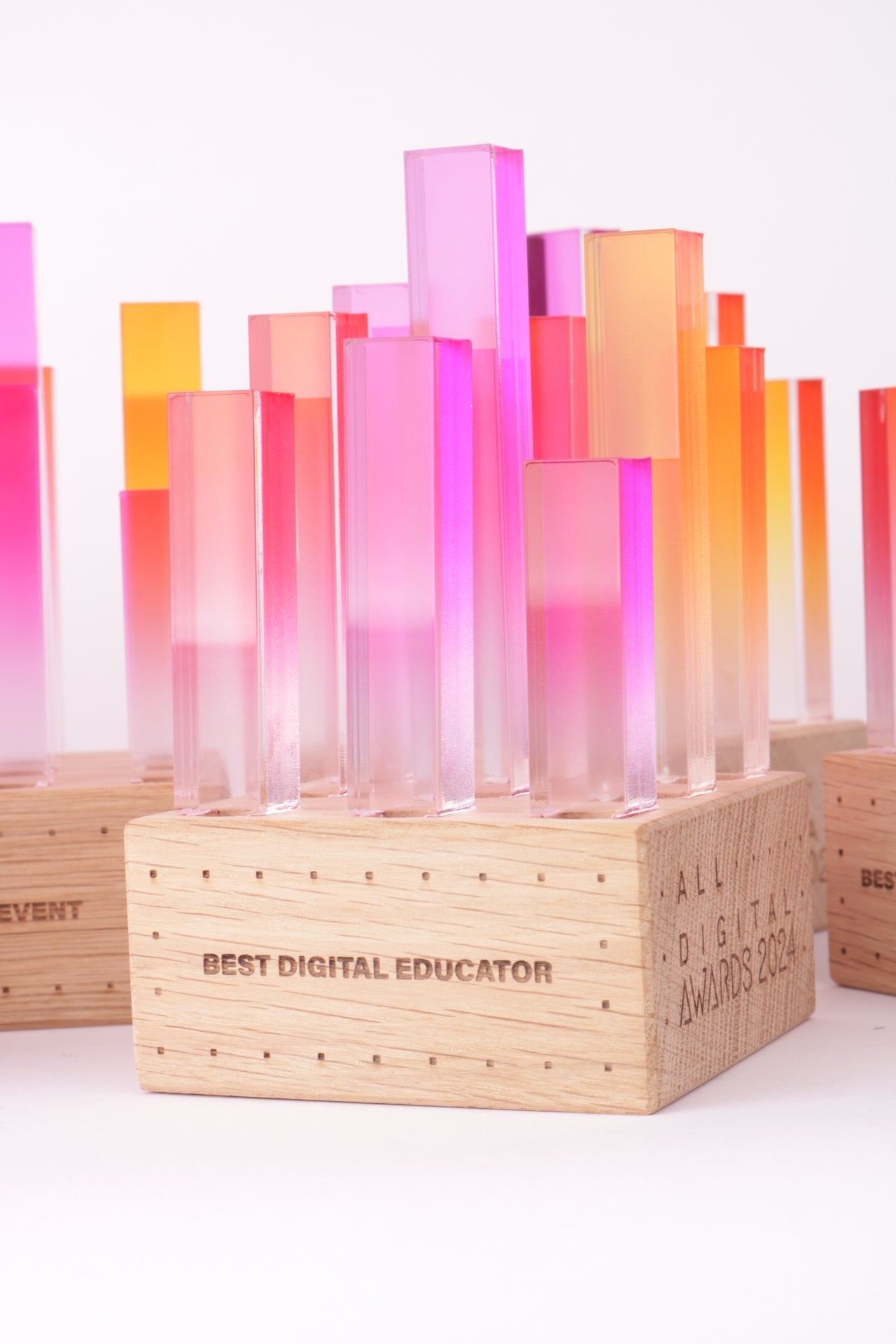 wooden base with colorful glass trophy's